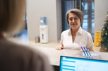 Lady Checking In At The Dentist